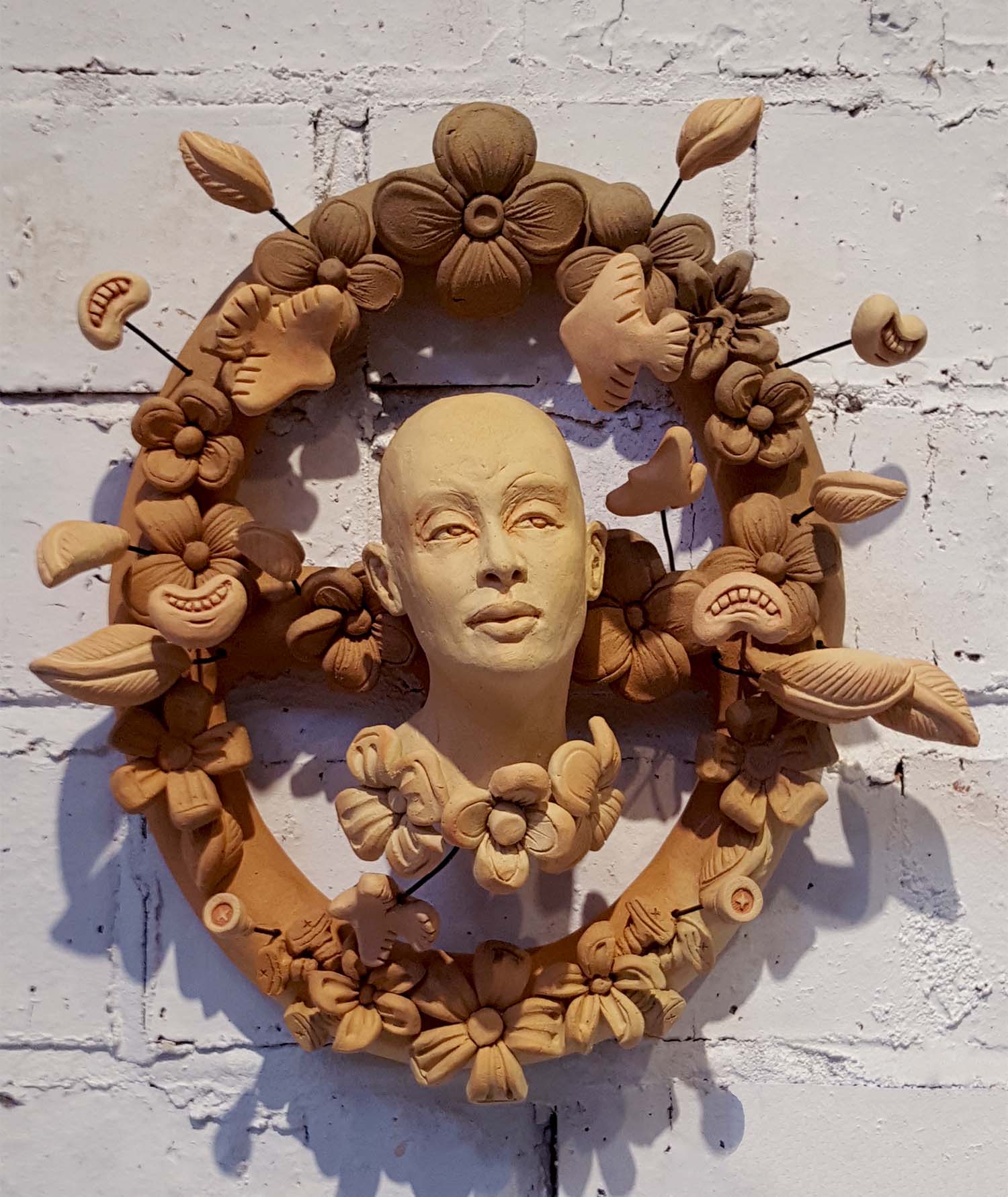 ceramic artwork on a wall