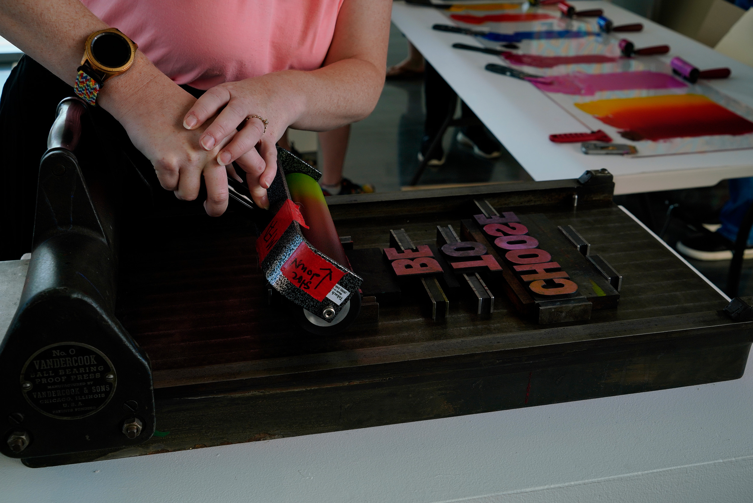 image of person using letterpress