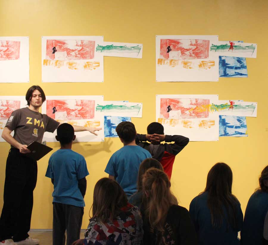 Group tour being led by a docent at the Zuckerman Museum of Art