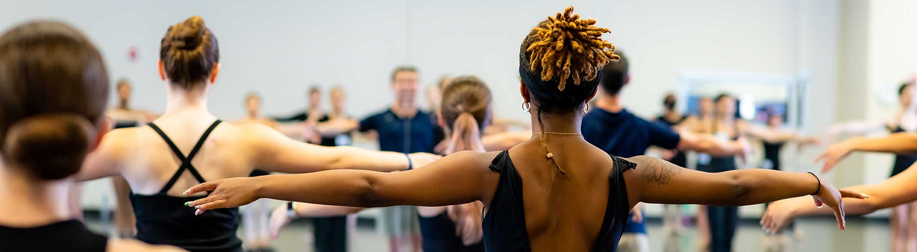 photo of dancers rehearsing