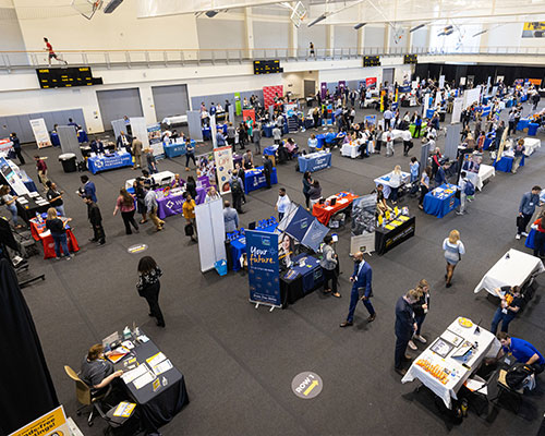 ksu students at job fair event visiting tables