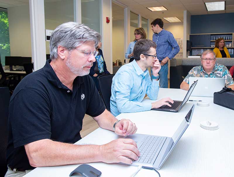 Data Science research students working on a group project