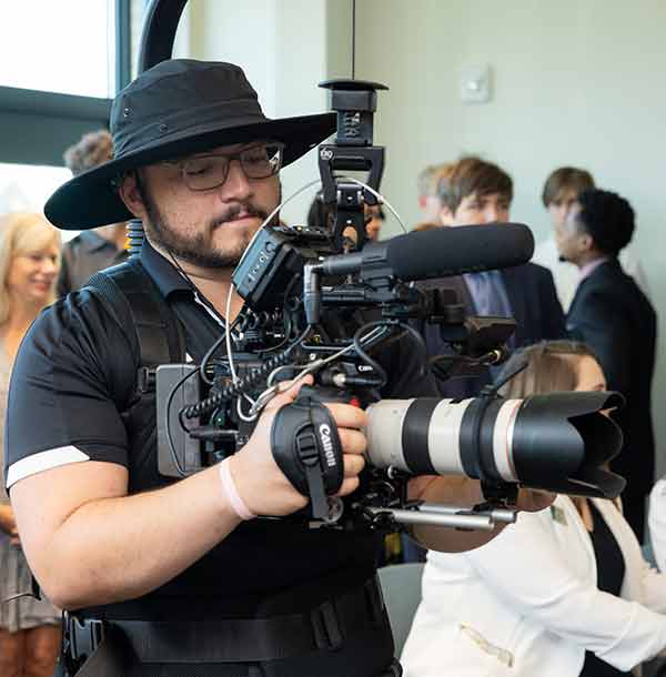 ksu camera man holding camera