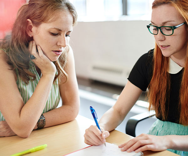 ksu student receiving advise with problem solving