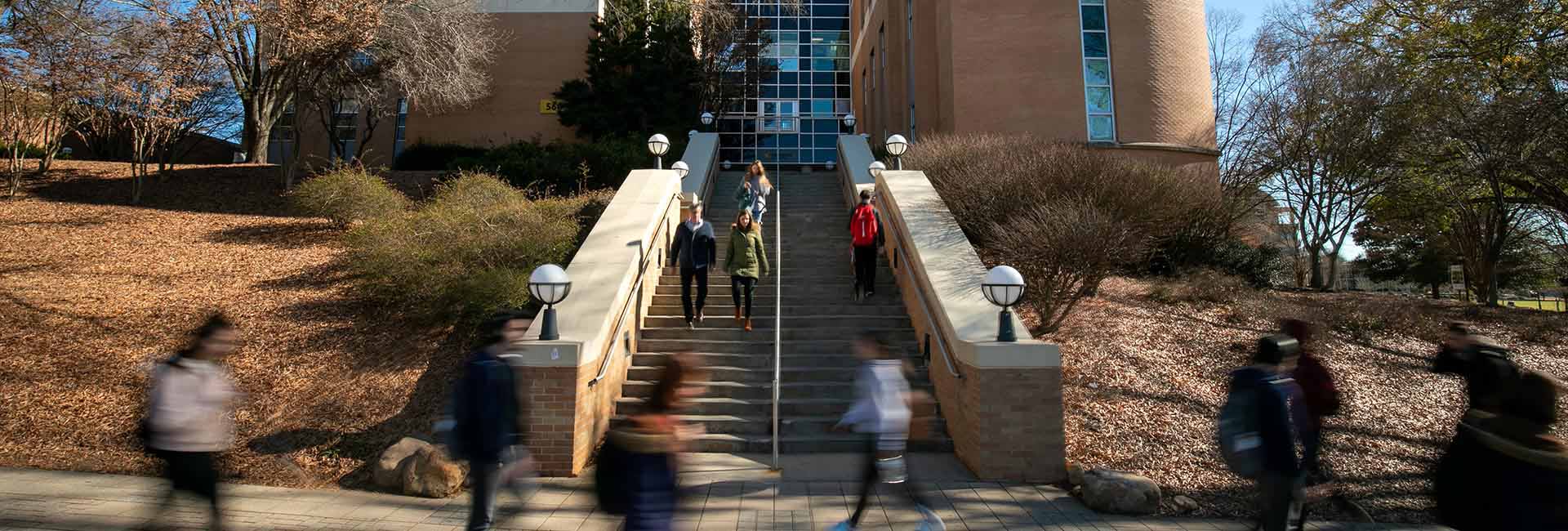 ksu students walking up stairwell outside kennesaw campus