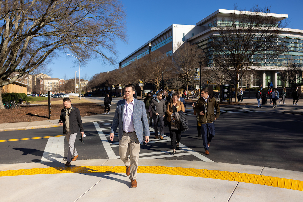 coles schools of business economic majors walking across ksu campus