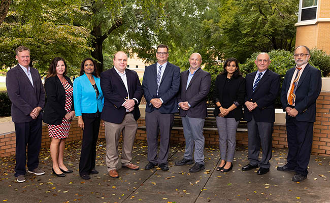 photo of ksu phd marketing professors standing together outside