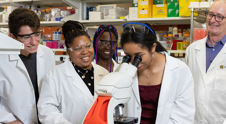 Photo of U-RISE mentors and students in a lab at Kennesaw State University