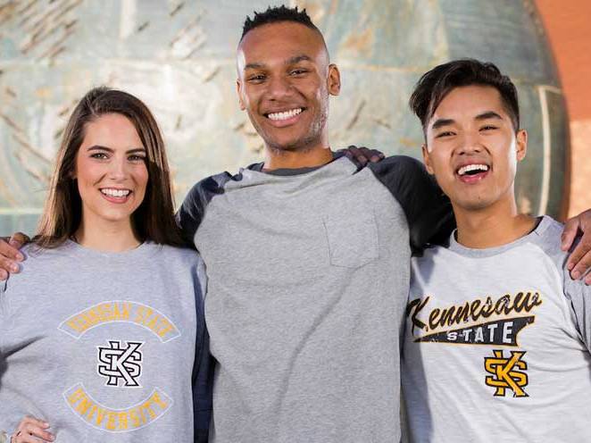 Group of students standing together smiling for a picture