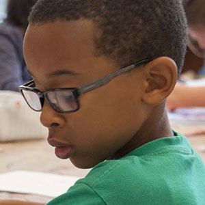 Young student working on school work