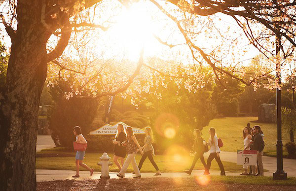 KSU students walking at kennesaw campus during sunset