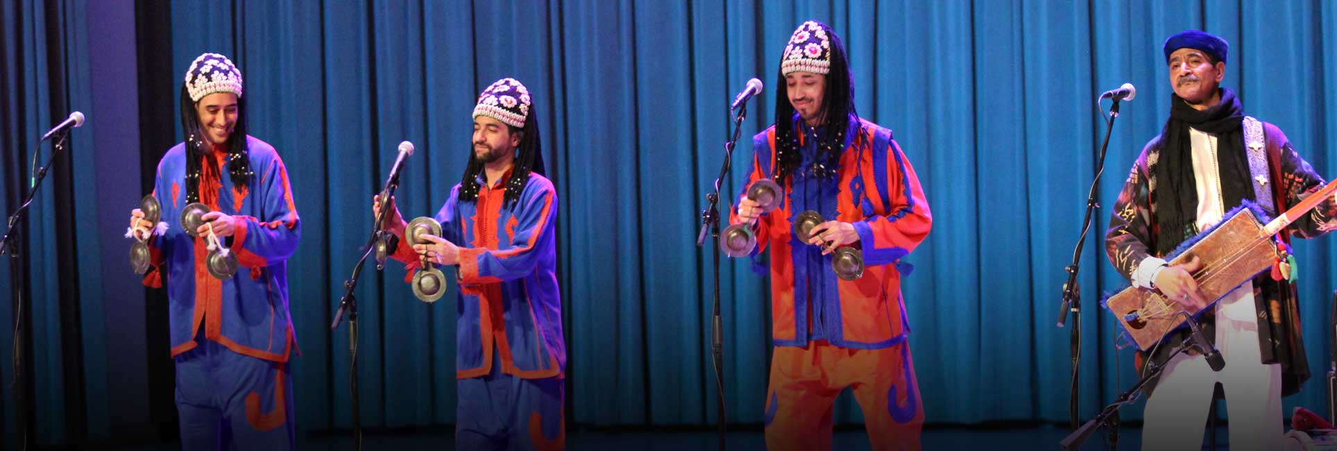 tradition cultural music group on stage perfroming