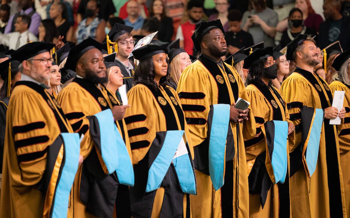 ksu graduate college staff attending commencement ceremony