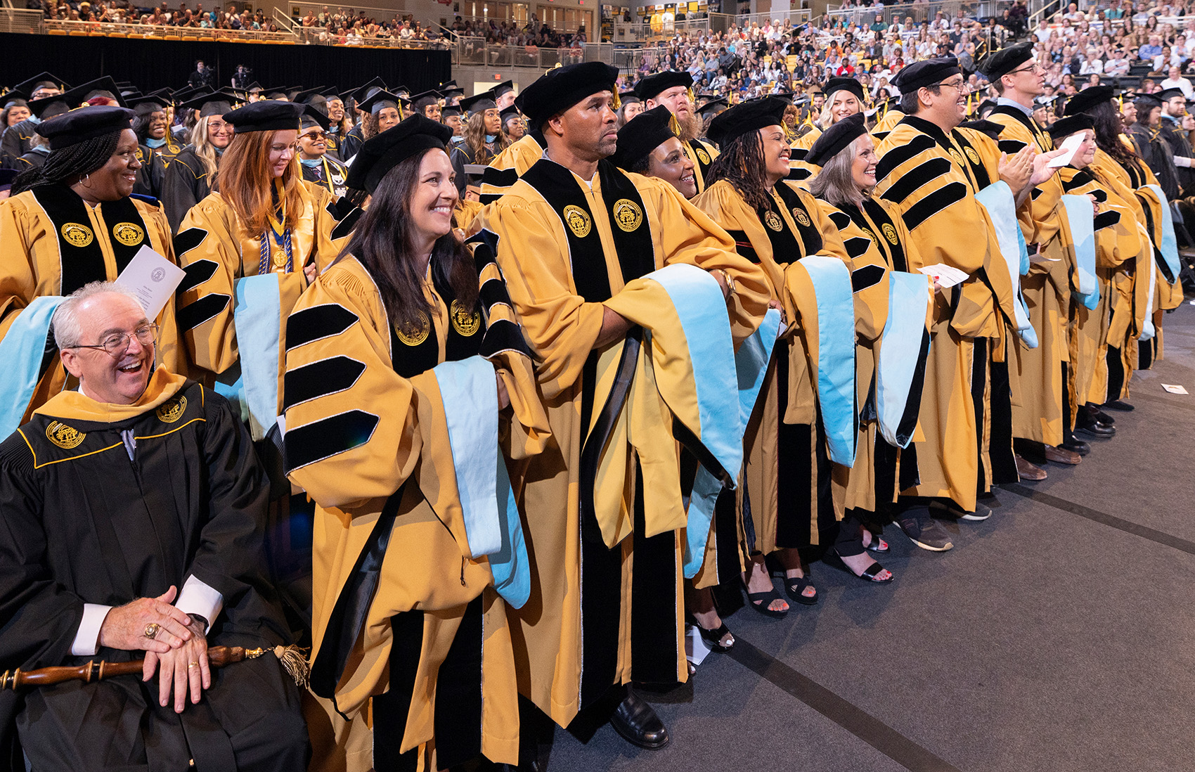 family attending KSU commencement ceremony