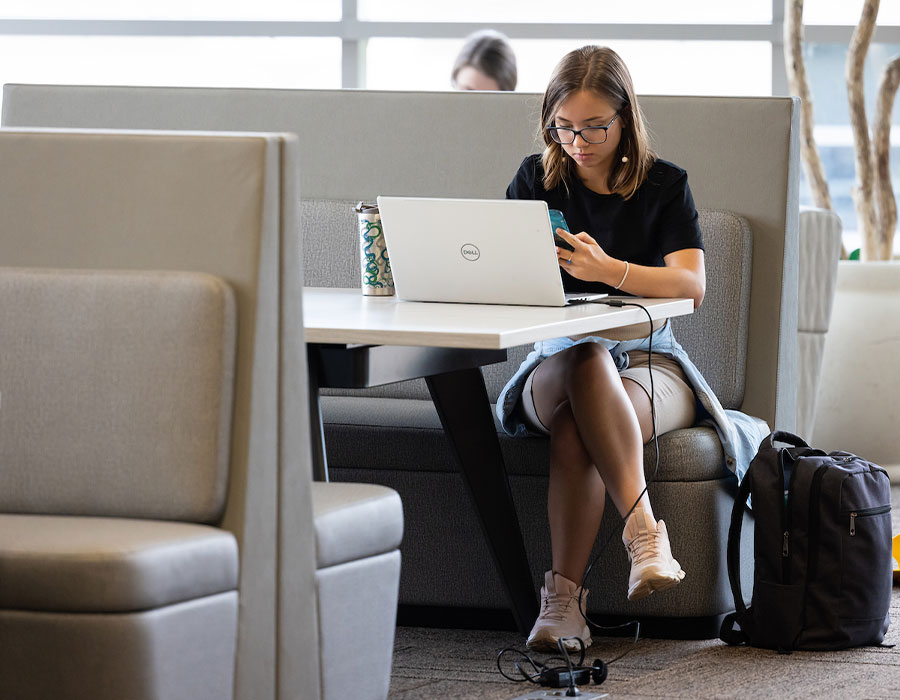 ksu student studying on laptop