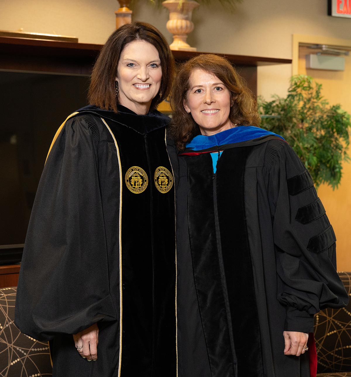 Photo of President Kathy Schwaig and Georgia McGaughey