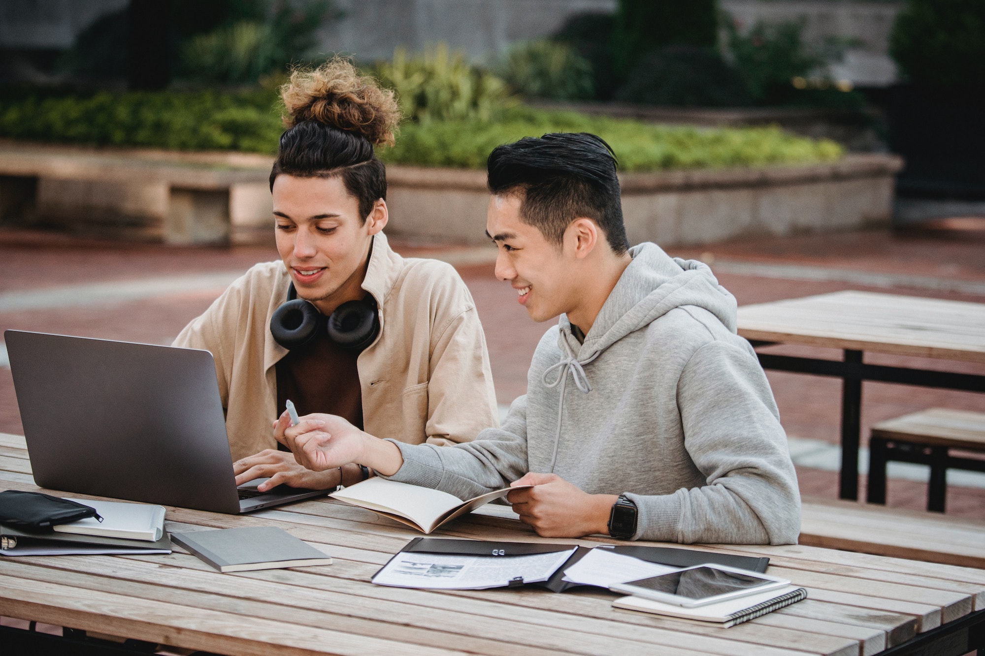 man using a laptop outside