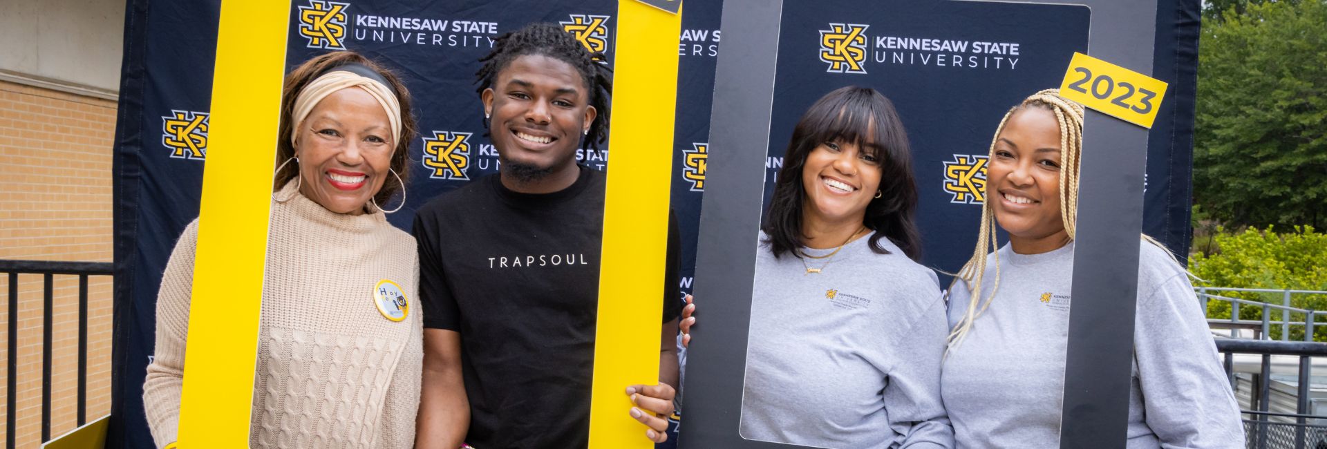 ksu student posing with family members