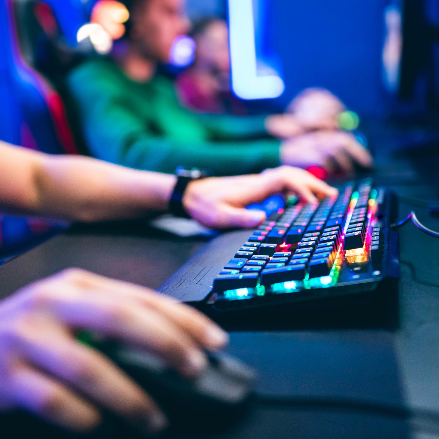 Student using a keyboard to play video games.