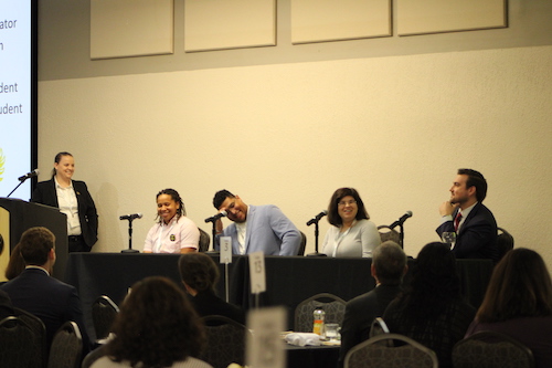 People talking on a panel Recovery Science Research