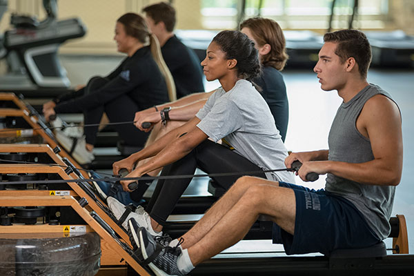 ksu students using rowing exercise machines