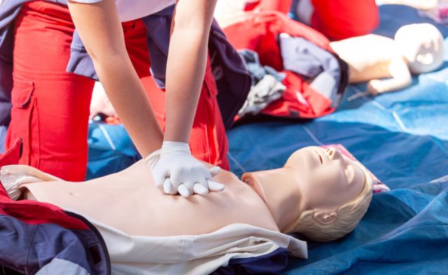 practicing cpr on dolls