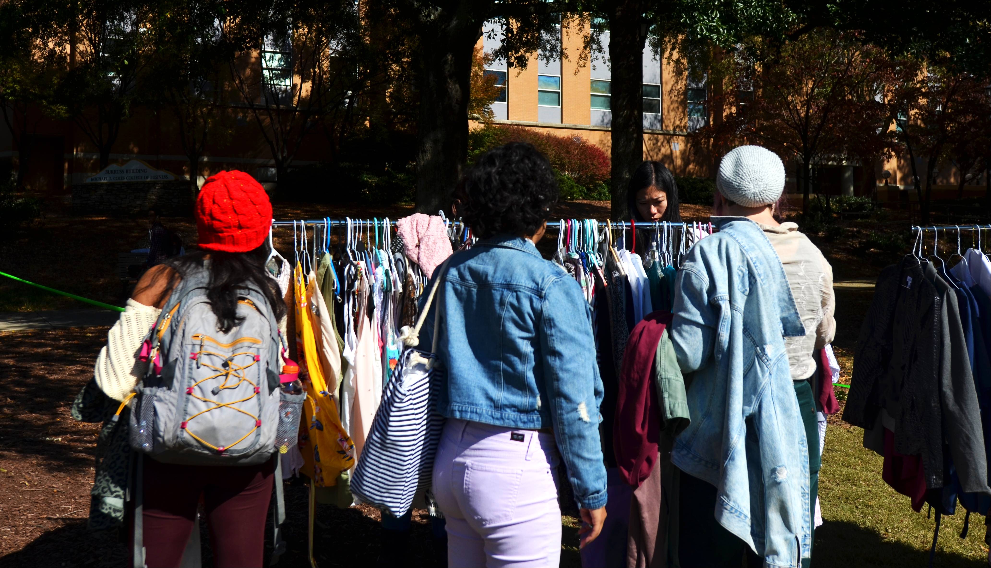 students outside at an OwlSwap event