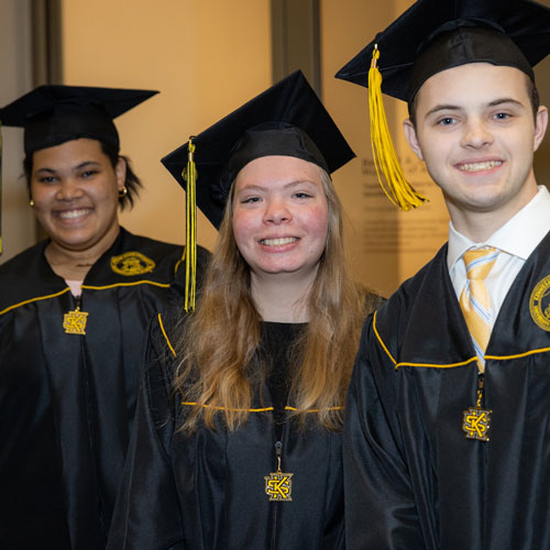 Academy students in graduation garb